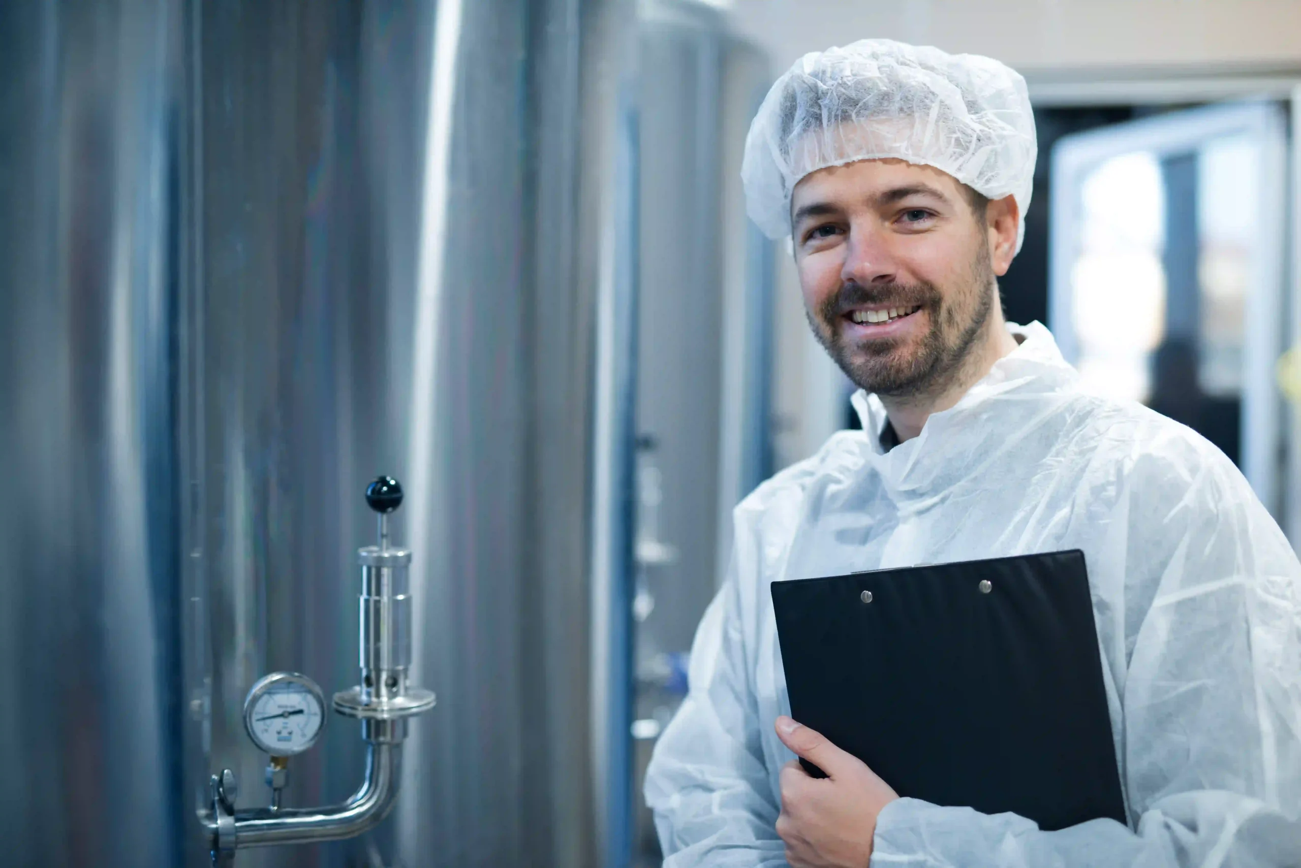 Industrial blast chiller engineer in UAE inspecting food processing equipment to ensure rapid cooling performance, safety compliance, and system reliability